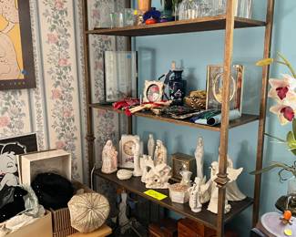Metal shelves, figurines, antique hats