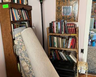 And more books, a couple of rugs, a lamp, a bamboo bookcase, and an antique bookcase.