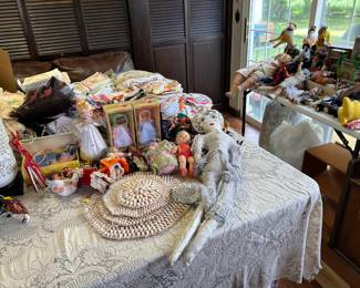 Dolls and antique linens