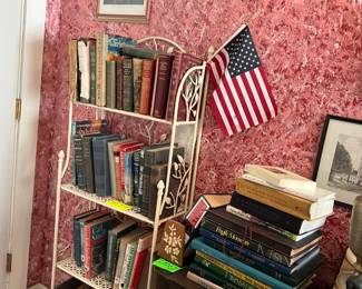 Books, pictures, shelves, and antique sewing chest