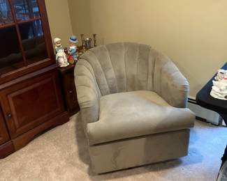 A PAIR of SWIVEL CLUB CHAIRS