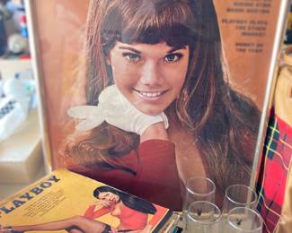 vintage men’s magazines —playboy glasses and a small barbie benton collection