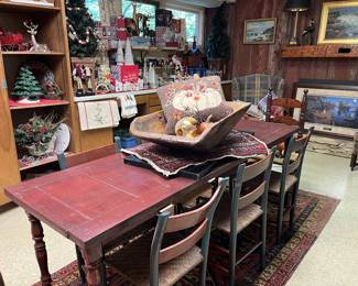 Harvest table with dough bowl scoop and rush seat chairs.
