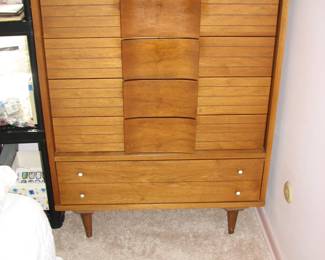 mid century dresser and the boxes on top and sheet music