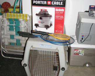 dog kennel, lawn chairs and a Porter Cable Vacuum