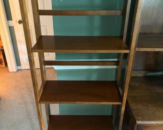 Light wood bookshelf.