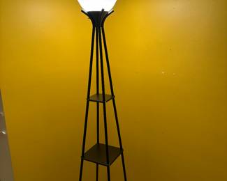 Bright lamp with shelving.