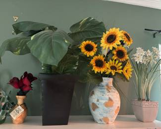 Vases and fake plants. Wooden vase is handcrafted.
