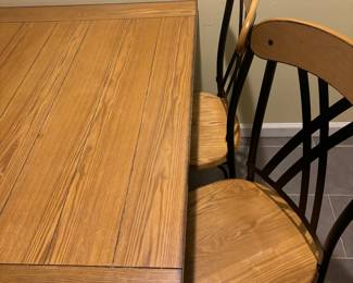 Four kitchen table chairs.