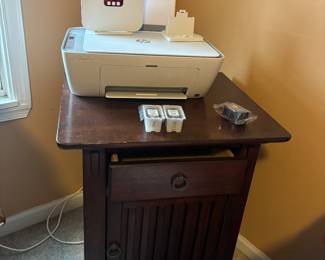 Bedside table that matches the bedframe and dresser. Printer is also for sale, with ink included.