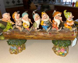 The Disney Traditions Seven Dwarfs Figurine is an intricately sculpted stone resin figurine of Snow White's beloved dwarfs. It is available from a variety of retailers, including Jim Shore,...