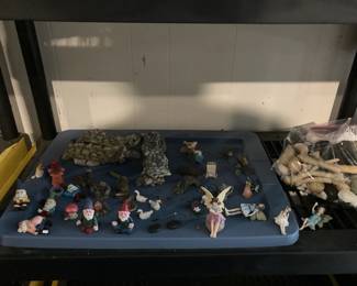 Large collection of fairy houses and garden art
