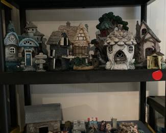 Large collection of fairy houses and garden art