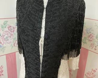 Stunning dress form with vintage silk shawl and handmade tablecloth.