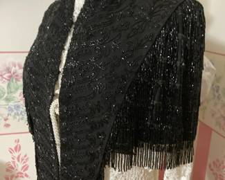 Stunning dress form with vintage silk shawl and handmade tablecloth.