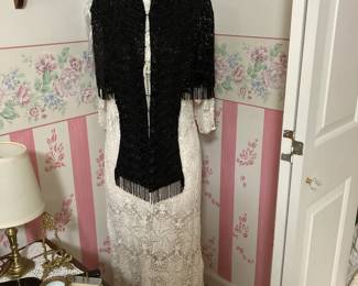 Stunning dress form with vintage silk shawl and handmade tablecloth.