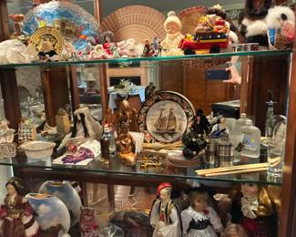 Cabinet full of a lifetime's memories from world travels. Amazing variety of cultures represented!