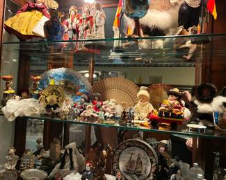 Cabinet full of a lifetime's memories from world travels. Amazing variety of cultures represented!