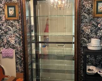 Curio cabinet with stunning frame detail