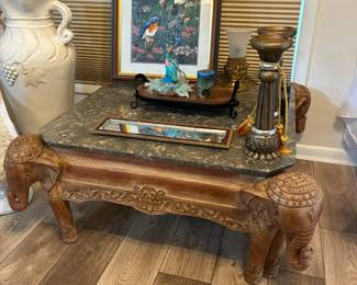 Marble top coffee table with elephant head detail-- great conversation piece!