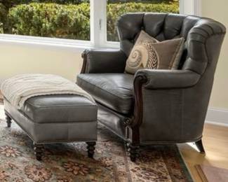 Pair of beautiful slate custom leather chairs with one matching ottoman.