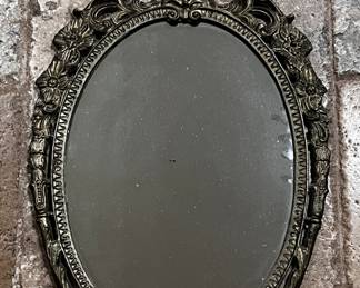 Carved mirror