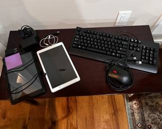 Kindles, keyboard and mouse.