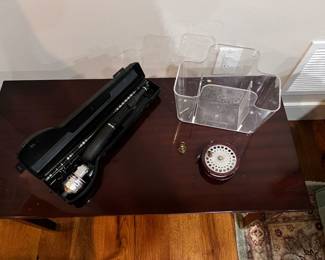 Backpacking fishing rod and reel.