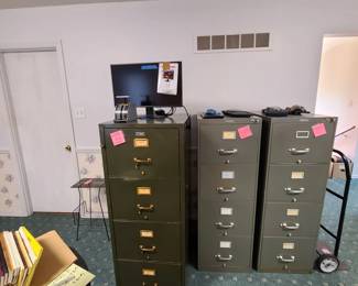filing cabinets, computer monitor. keyboard