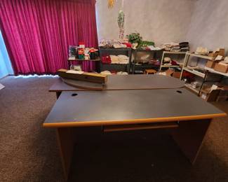 large desk, towels, linens, candles, small appliances