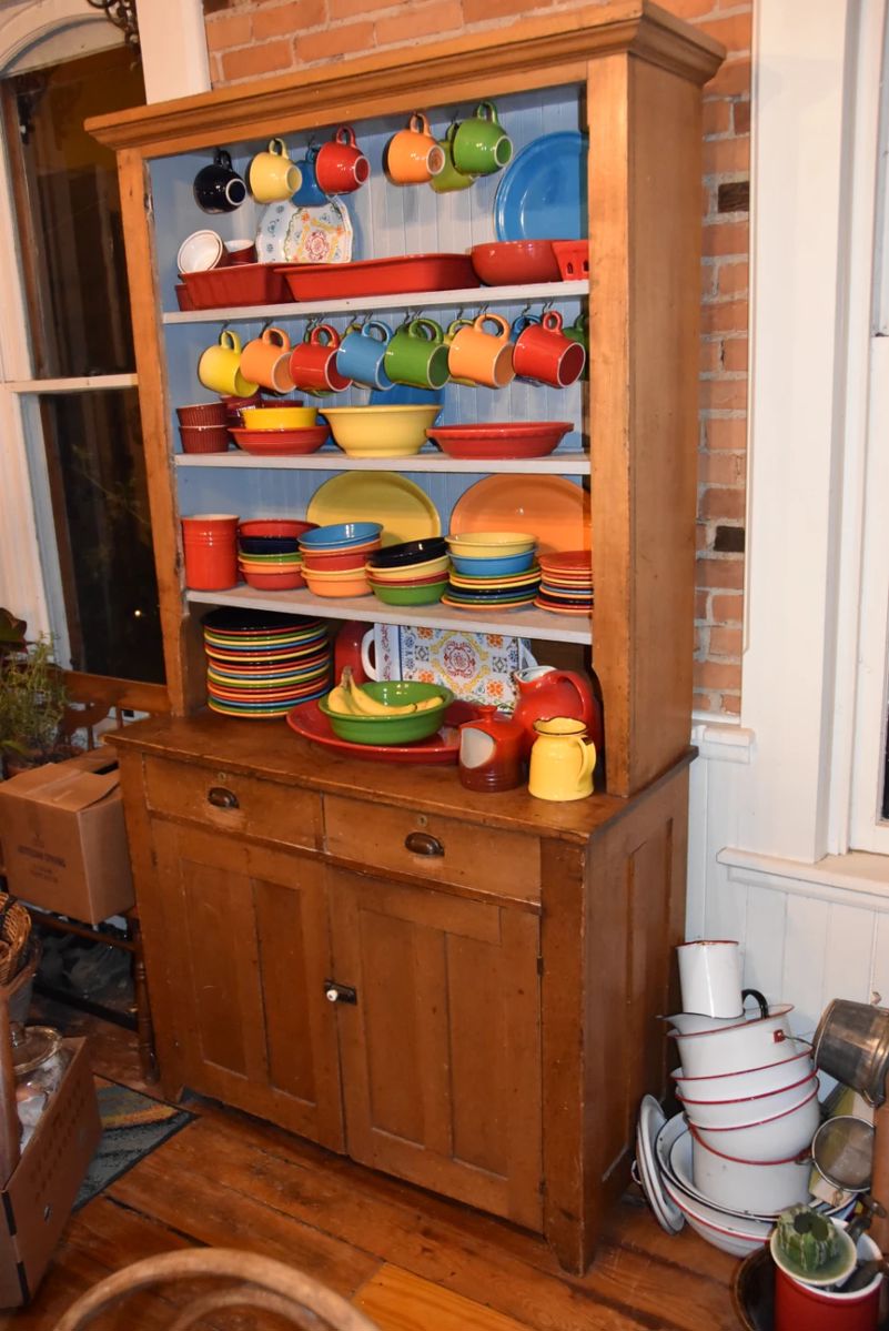 Antique Stepback Cupboard full of Fiesta
