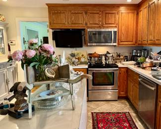 Huge kitchen - packed with everything from pots and pans to antique rugs!