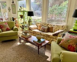 3 swivel chairs, leopard rug (so cute) MCM surfboard coffee table, green glass lamps, custom pillows...