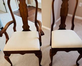 2 Chairs with arms and 4 without that go with the dining room table