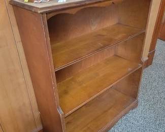 Vintage bookshelf and figurines