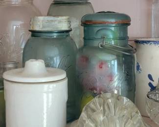 Cabinet lot of flower frogs, jars and planters