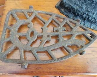 Colt cast trivet/iron rest