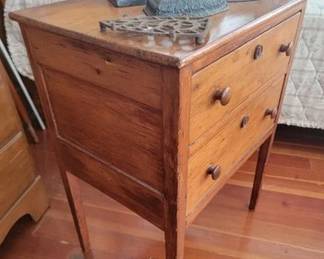 Antique sewing cabinet and cast sad irons