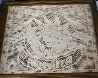 framed crocheted Lady Liberty