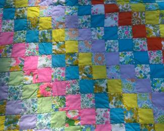 D64 - $100. Beautiful Homemade Quilt. Excellent Condition! See Tape Measure on ground for an idea of size.