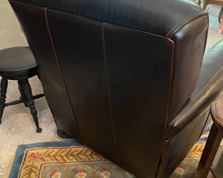 D13 - $225. Bradington Young Leather Chair. Measures 39" wide x 31" deep x 37" tall. Floor to seat is 19" tall.