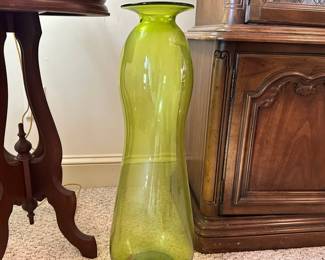 D27 - $95. Tall Green Hand Blown Blenko (?) Vase. Measures 27" tall. No issues noted.