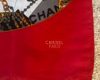 D9 - $150. Chanel Paris Scarf. 100% Seta-Silk. Signature Chanel CC Interlocking Logo Scarf. Does have some staining.