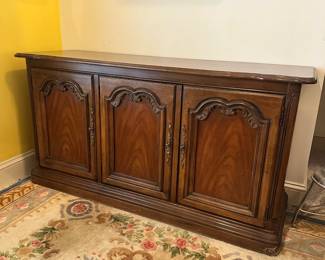 D18 - $125. Solid Wood Buffet. Measures 57.5" wide x 18.5" deep x 30" tall.