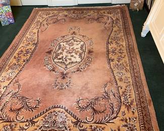 D15 - $125. Area Rug. Measures 127" x 80.5"