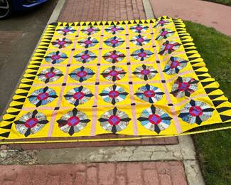 D54 - $75. Hand Pieced Quilt Top (no backing - unfinished) Bright colors! See Tape Measure on ground for an idea of size.