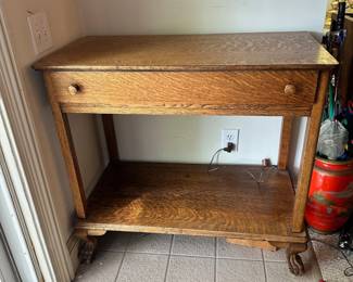 D20 - $175. Antique Solid Oak Buffet Table with Carved Claw Feet. Drawer Slides. Measures 36" wide x 19" deep x 34" tall.