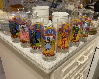 D69 - $30. The Wizard of Oz Drinking Glasses 50th Anniversary. 7 Pcs. Excellent Condition - colors are bright.