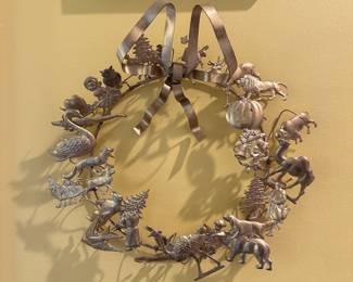 D91 - $60. Brass All Seasons Wreath.
