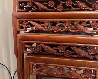 D29 - $225. Set of 4 Carved Nesting Tables. (I believe they are Rosewood) Largest Measures 19" x 14" x 28" tall. Top 3 have glass on top.